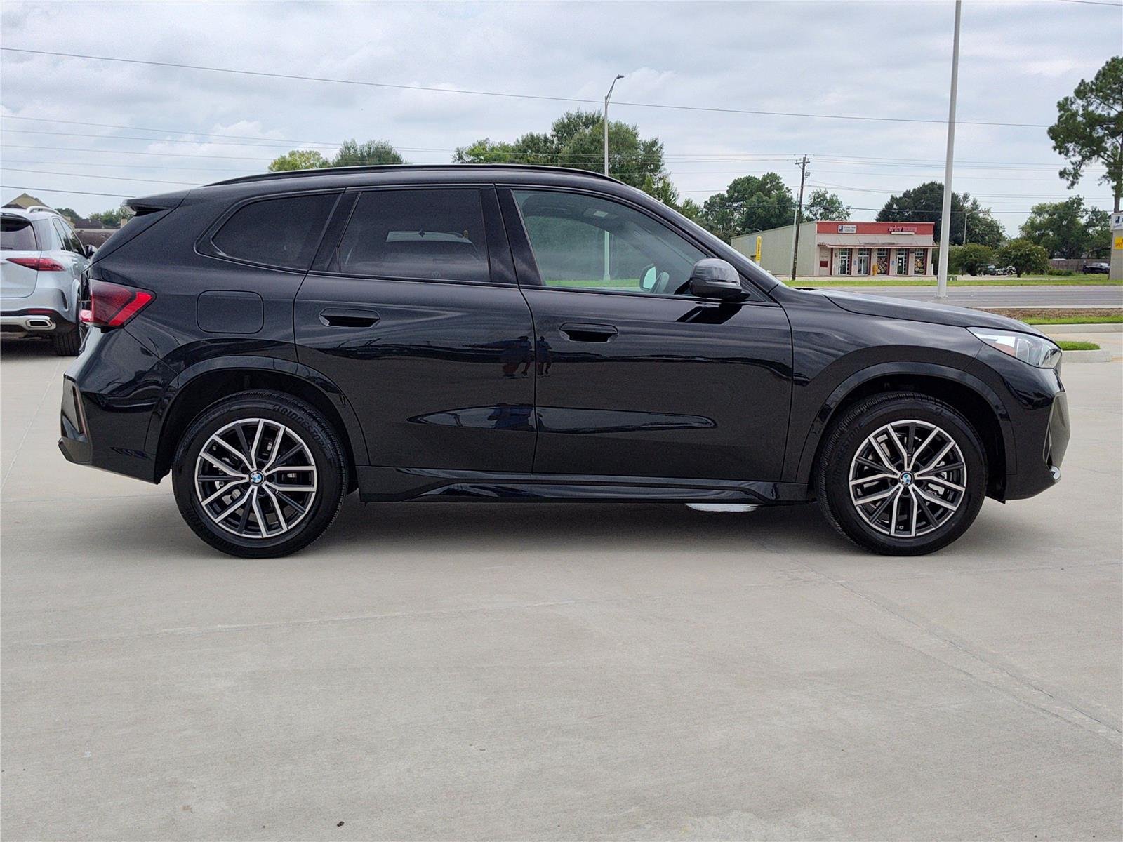 Certified Used 2025 Black Sapphire Metallic BMW xDrive28i image 10