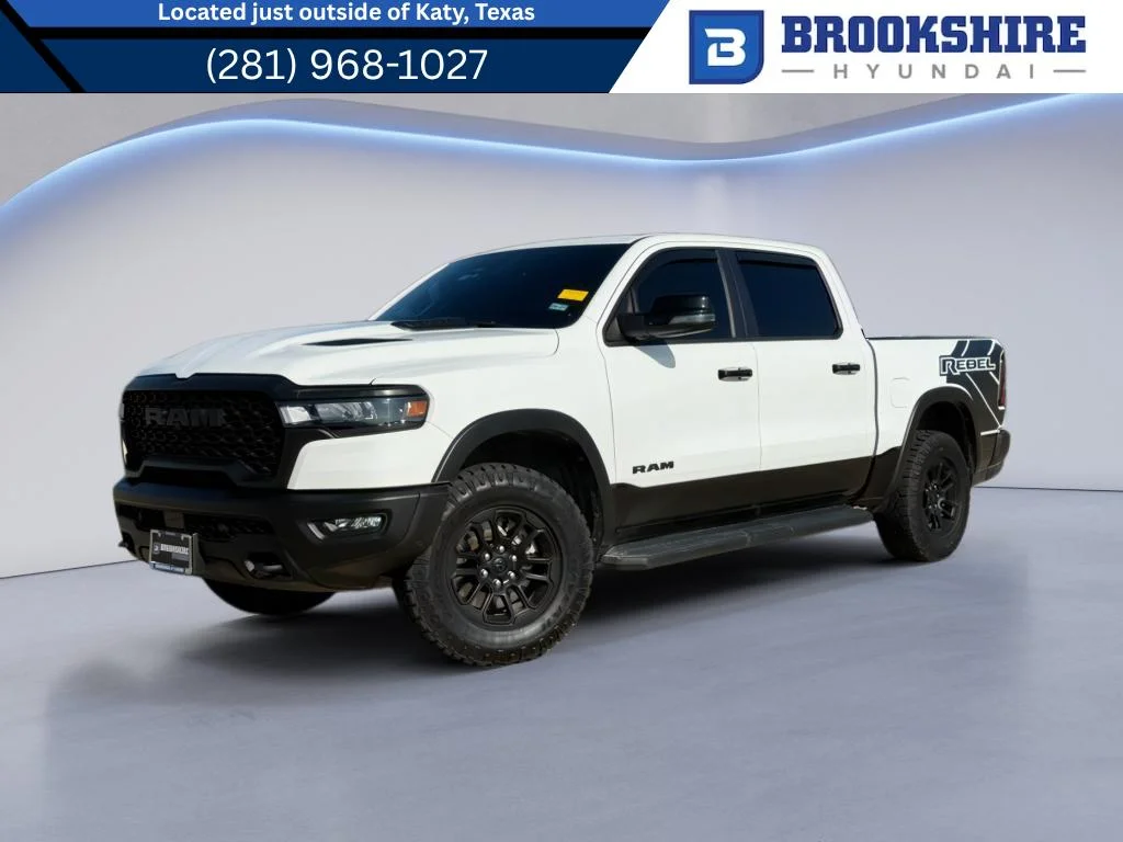 Used 2025 Bright White Clearcoat Ram Rebel image 1