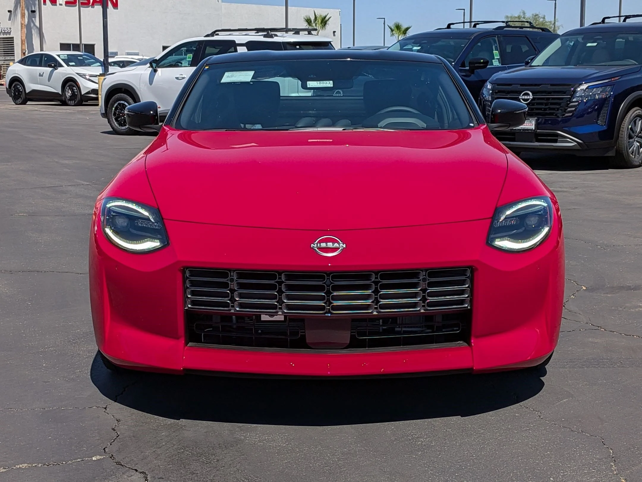 New 2026 Solid Red/Super Black Nissan Sport image 7