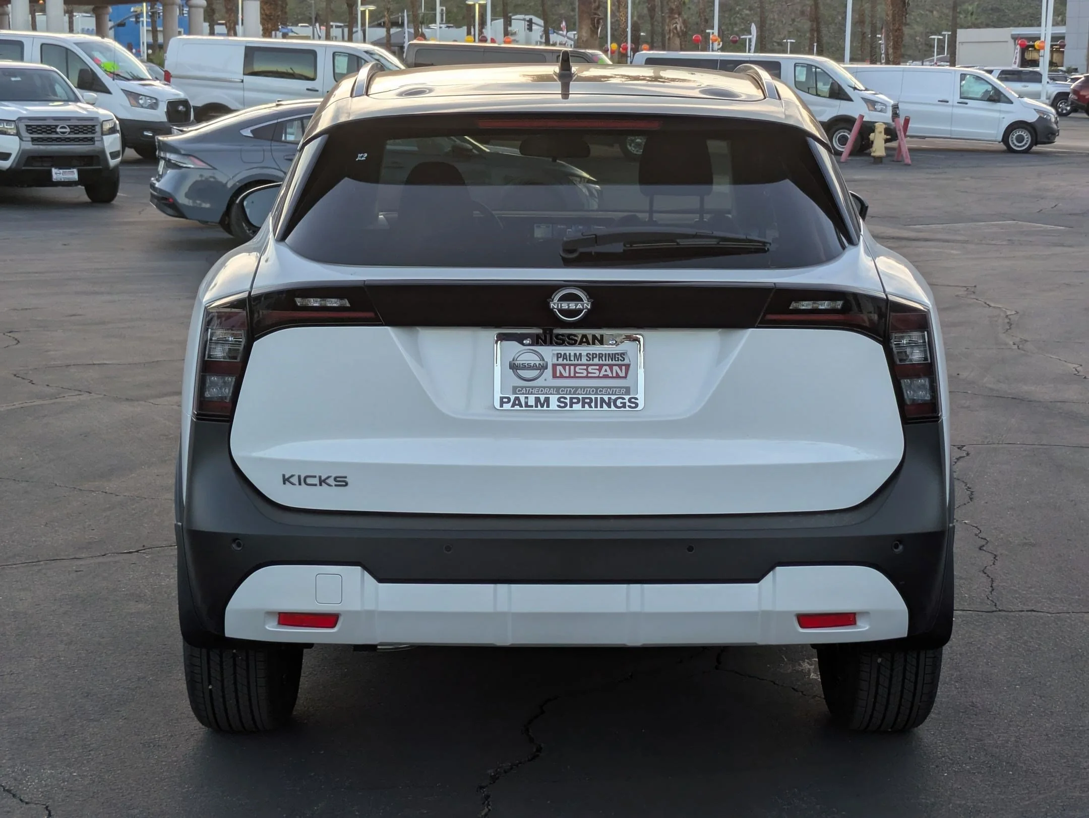 New 2026 Aspen White Tricoat/Super Black Nissan SV image 4