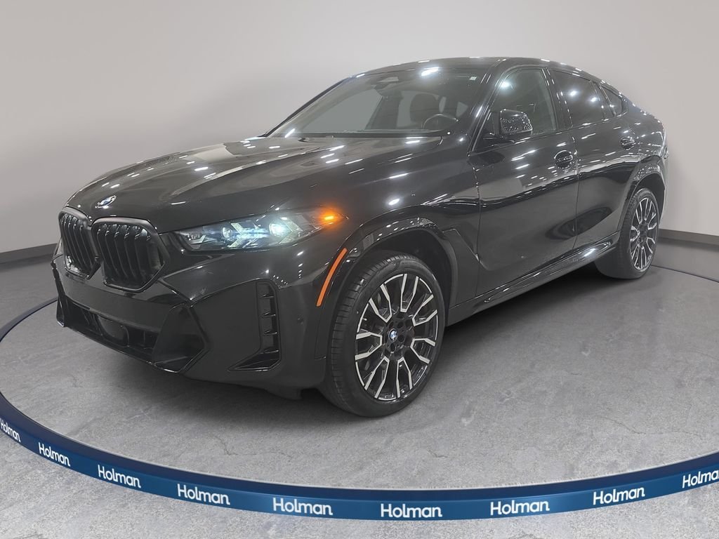 Certified Used 2024 Black Sapphire Metallic BMW xDrive40i image 1