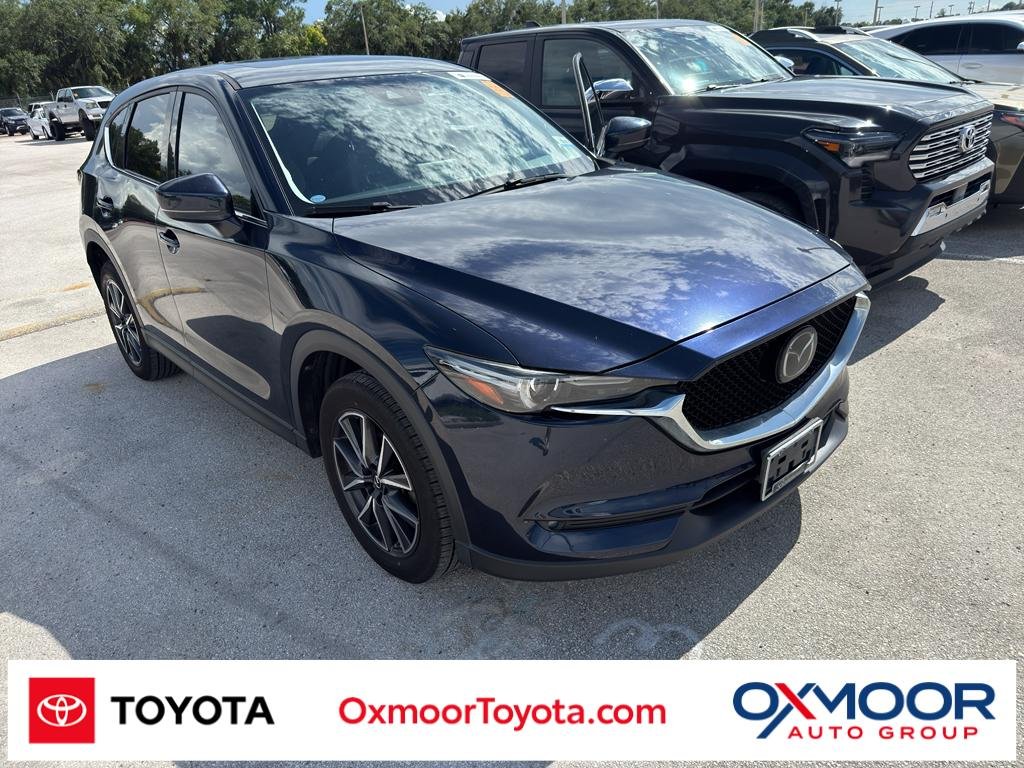 Used 2017 Deep Crystal Blue Mica Mazda Grand Touring image 1