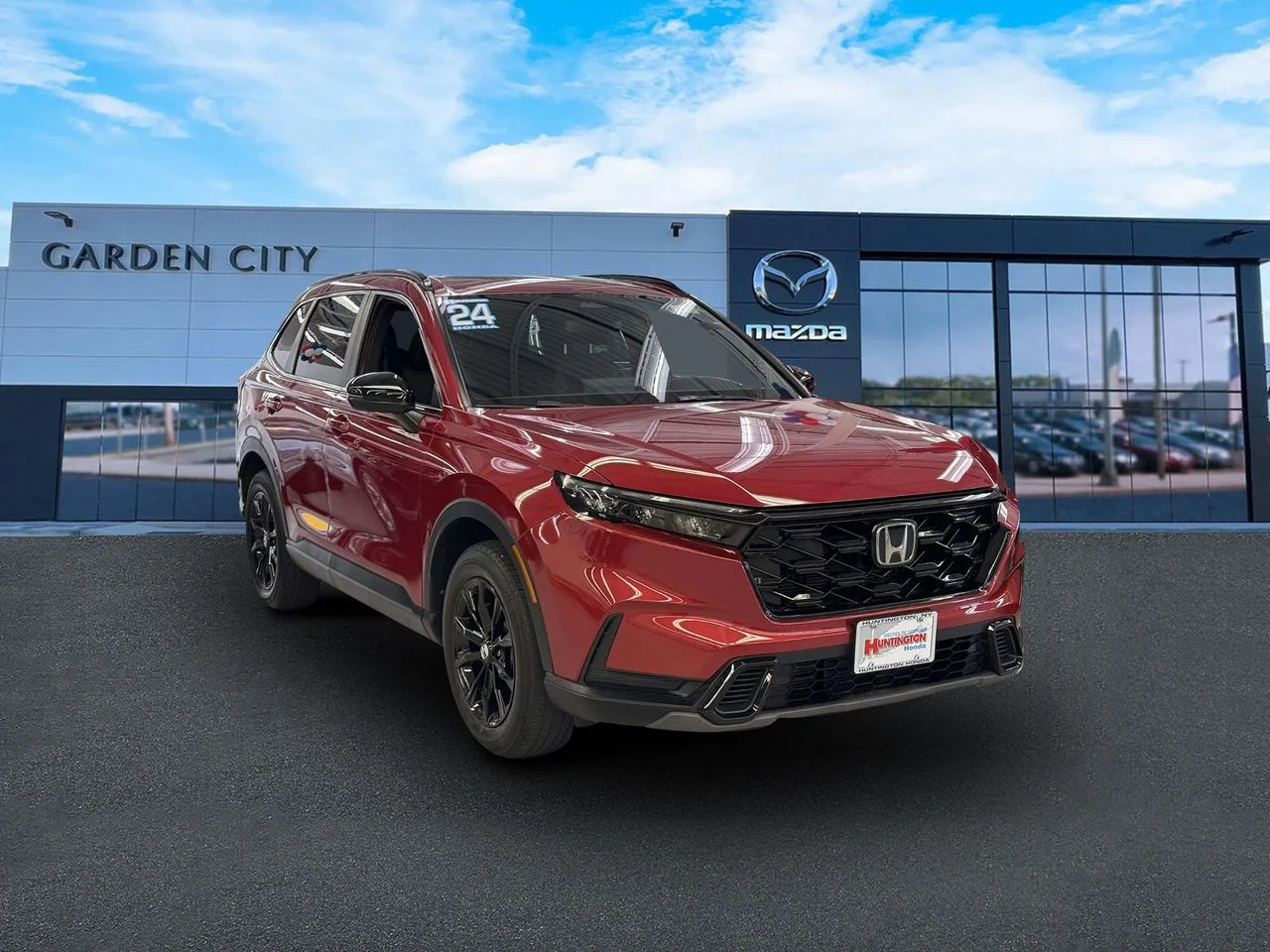 Used 2024 Radiant Red Metallic Honda Sport image 1