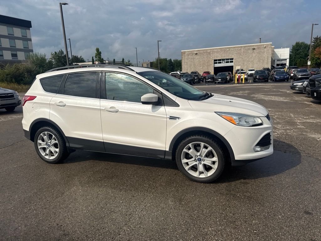 Used 2013 White Platinum Ford SE image 10