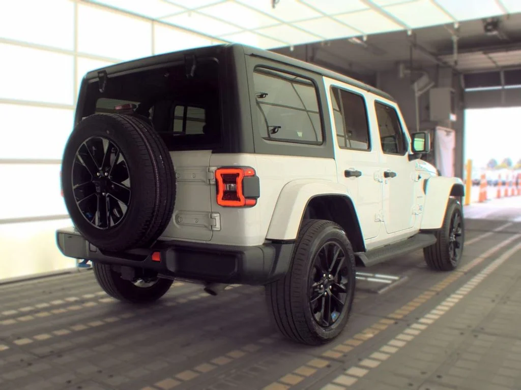 Used 2023 White Jeep Sahara 4xe image 2