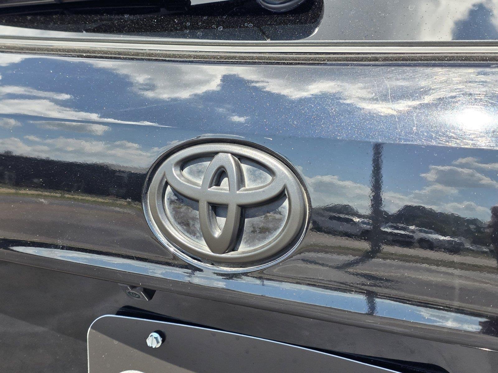 Used 2023 Midnight Black Metallic Toyota LE image 30
