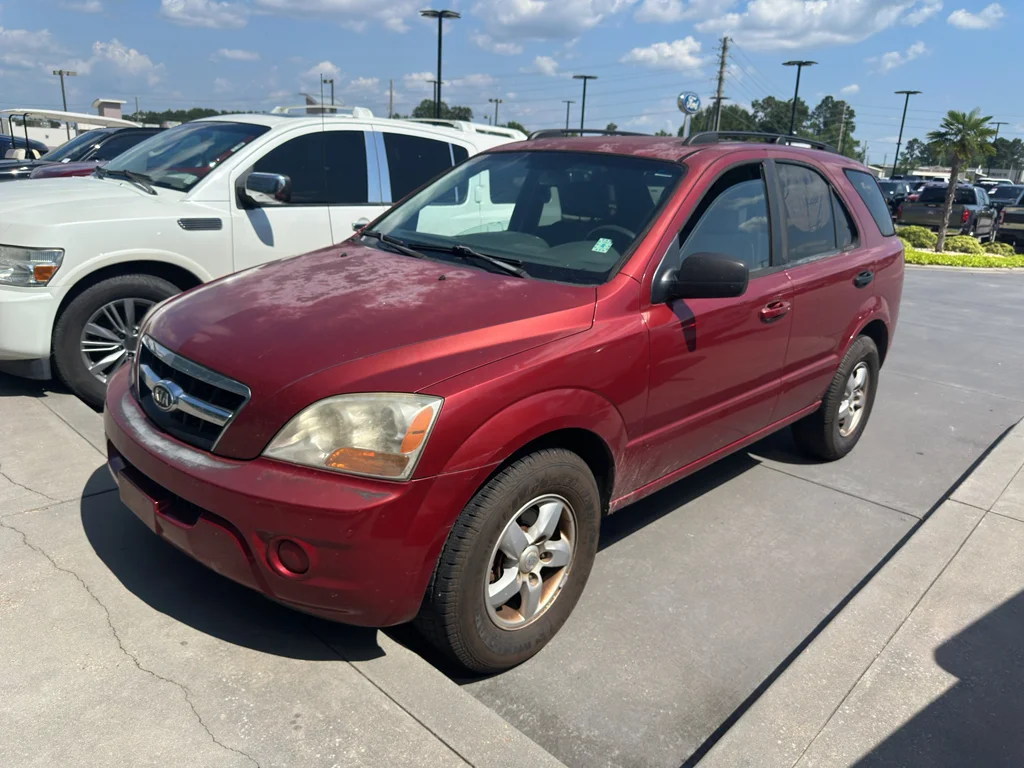 Used 2009 Spicy Red Kia LX image 1