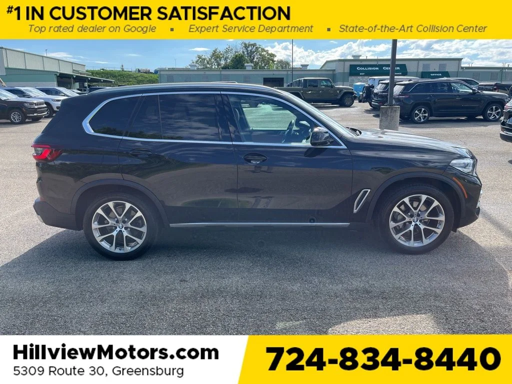 Certified Used 2022 Black Sapphire Metallic BMW xDrive40i image 7