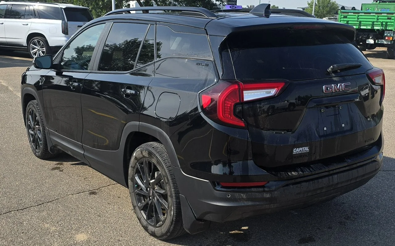 Used 2024 Black GMC SLE AWD image 3