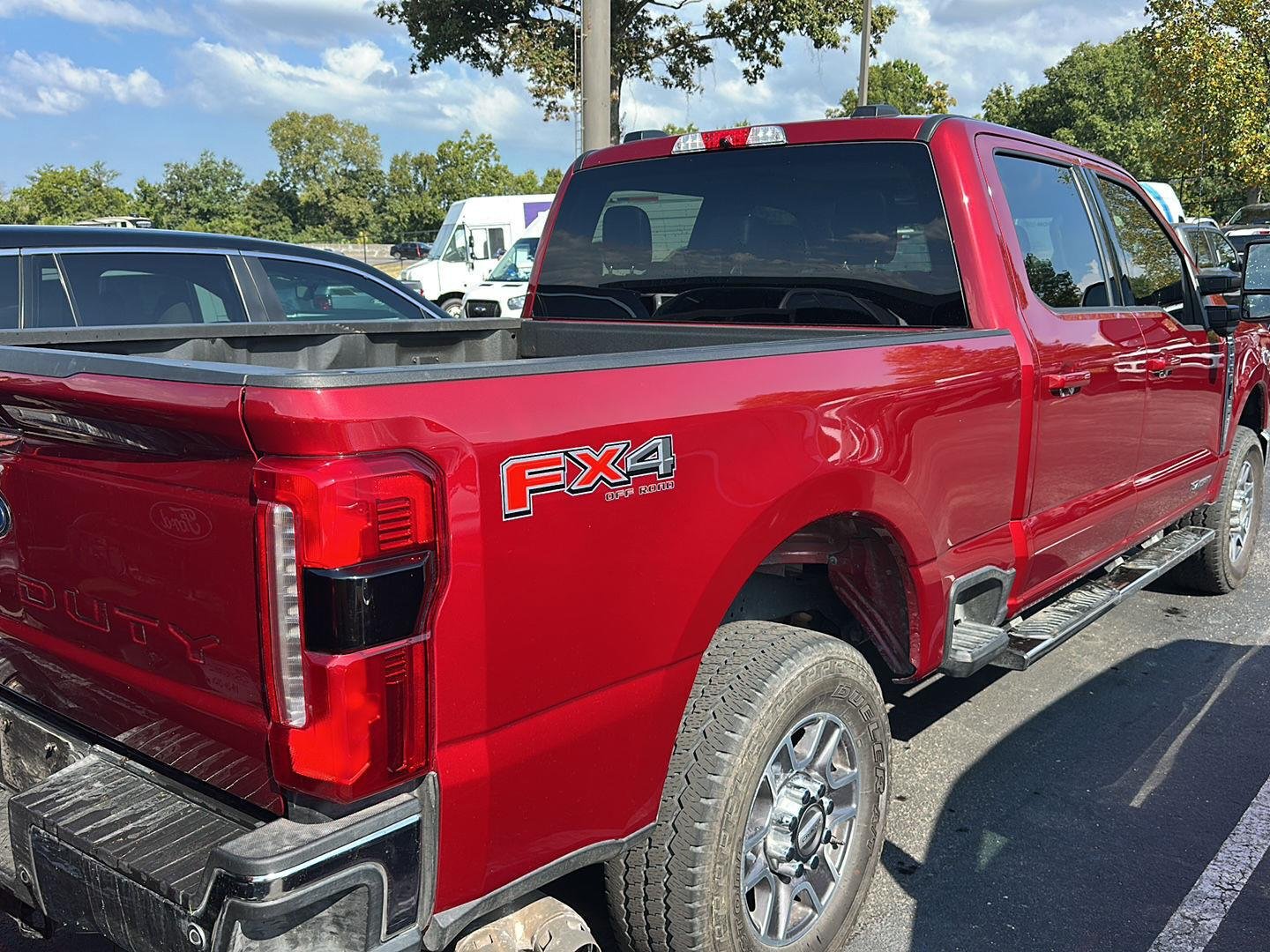 Used 2025 Ruby Red Metallic Tinted Clearcoat Ford LARIAT image 3