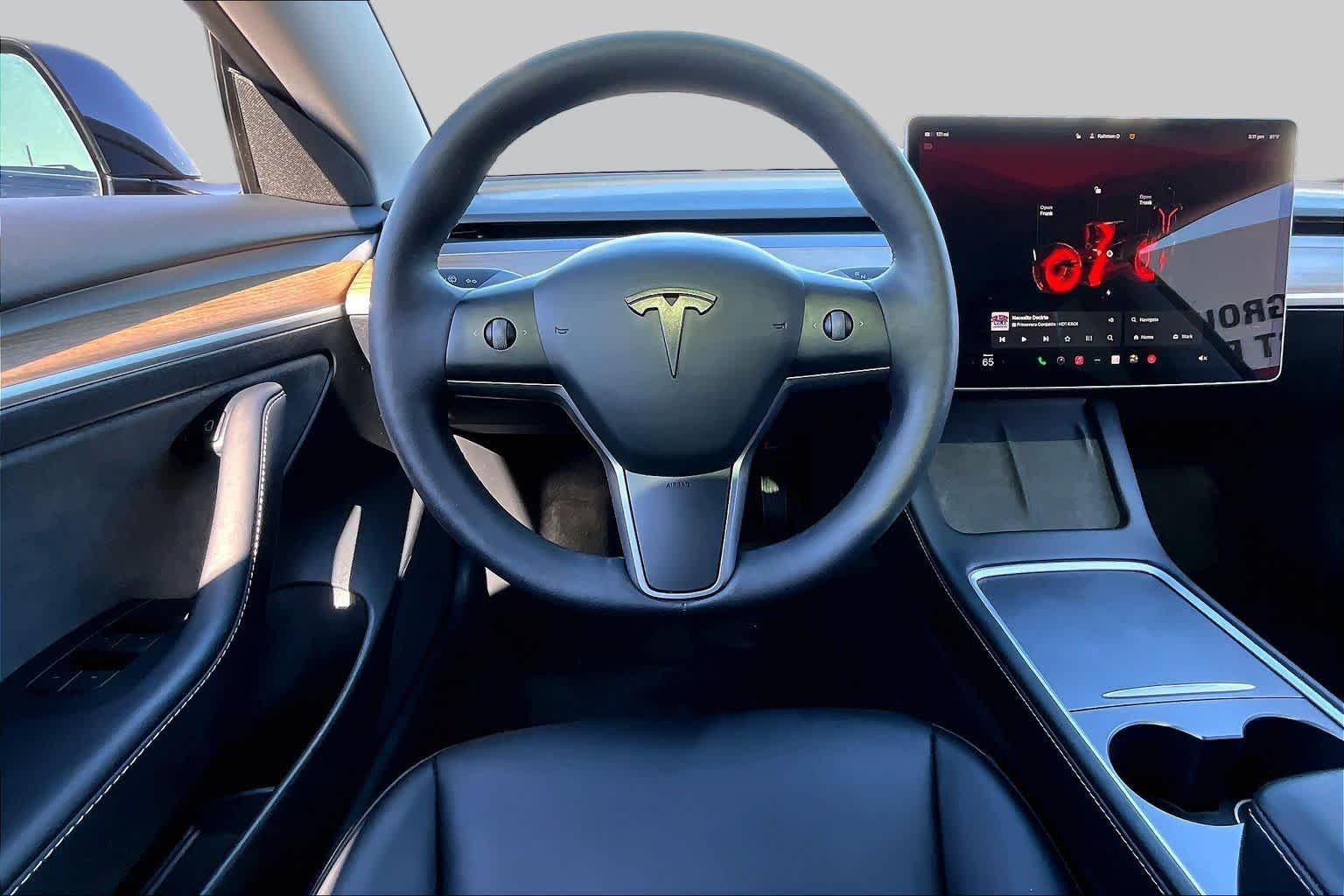Used 2023 Solid Black Tesla  image 5