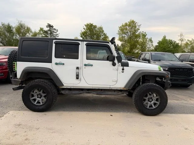 Used 2015 White Jeep Unlimited Sport image 6