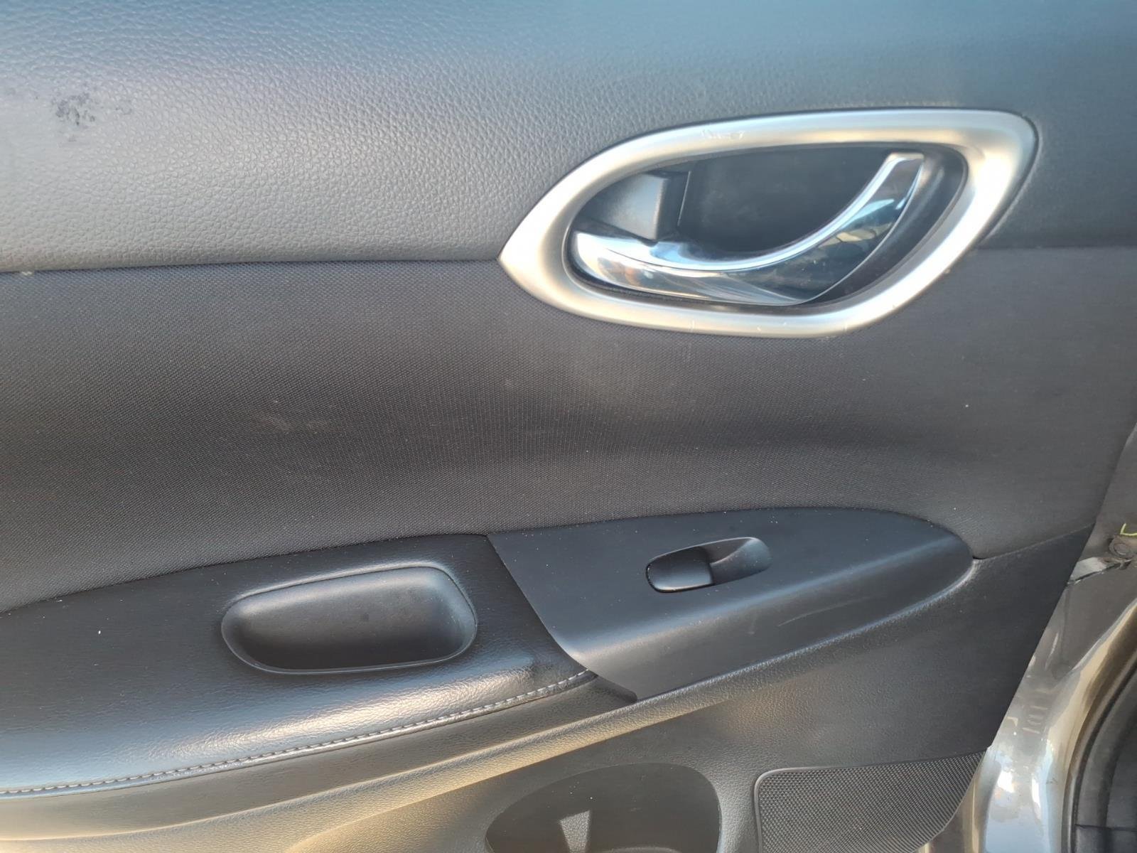 Used 2016 Gun Metallic Nissan SV image 12