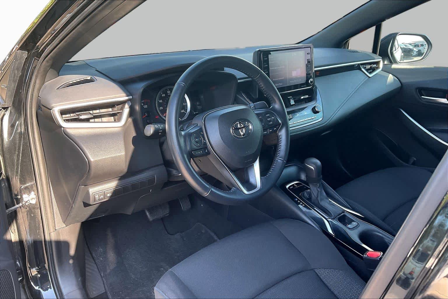 Used 2022 Black Sand Pearl Toyota SE image 17