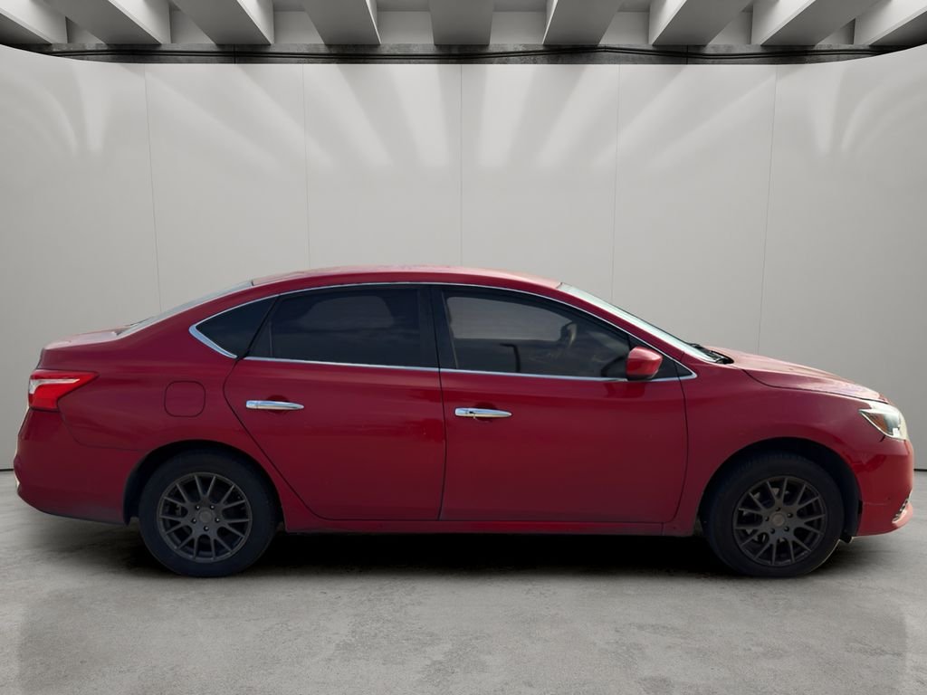 Used 2017 Red Alert Nissan SV image 6