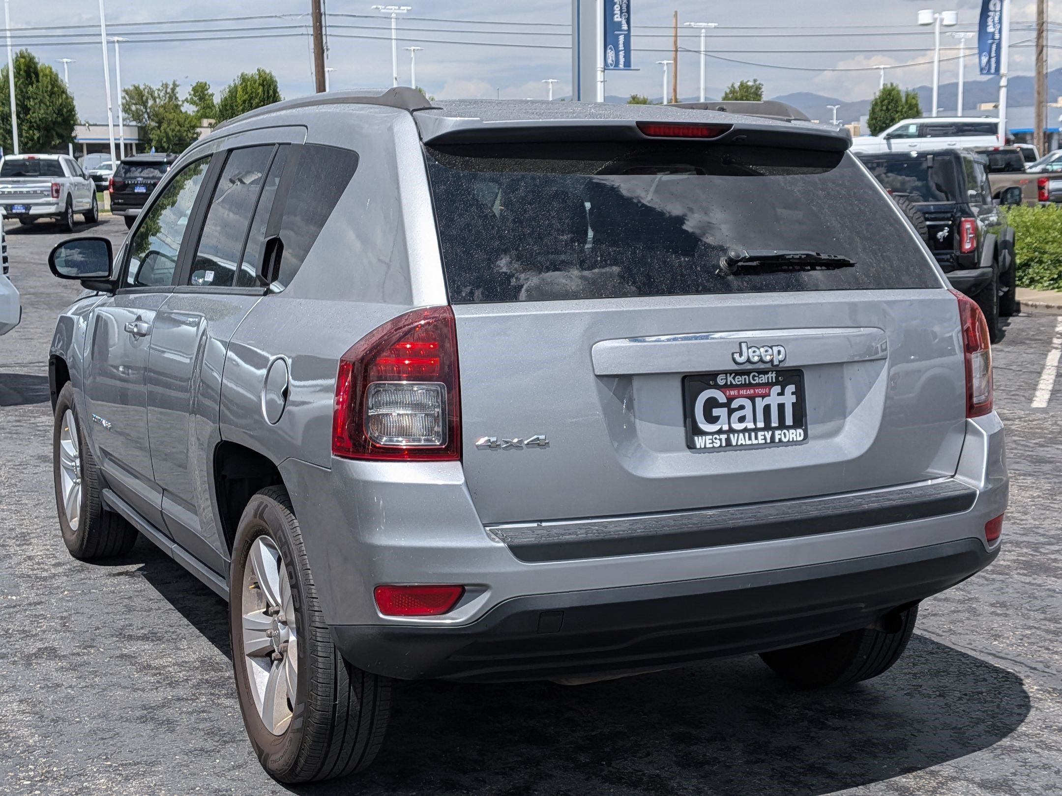 Used 2014 Billet Silver Clearcoat Metallic Jeep Sport image 5