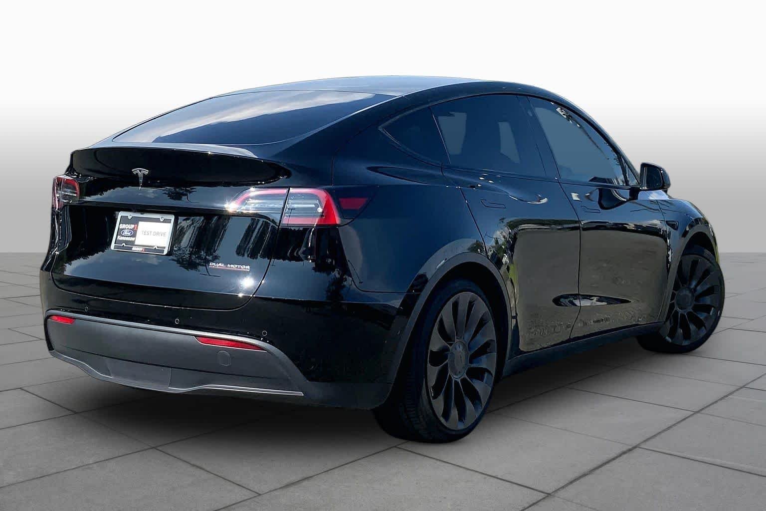 Used 2021 Solid Black Tesla Performance image 12