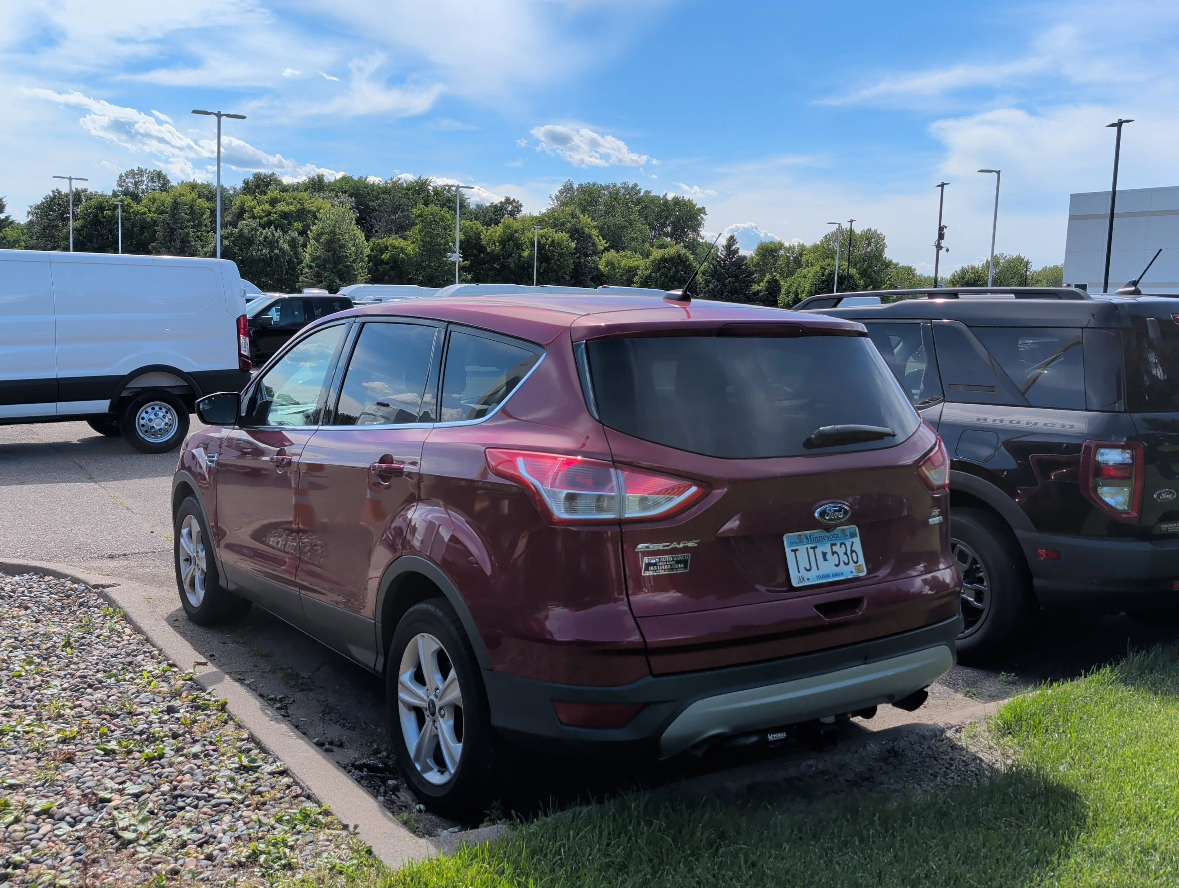 Used 2015 Ruby Red Metallic Tinted Clearcoat Ford SE image 3