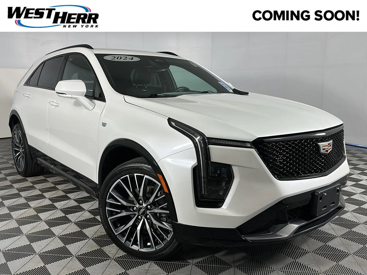 Used 2024 Crystal White Tricoat Cadillac AWD Sport image 1