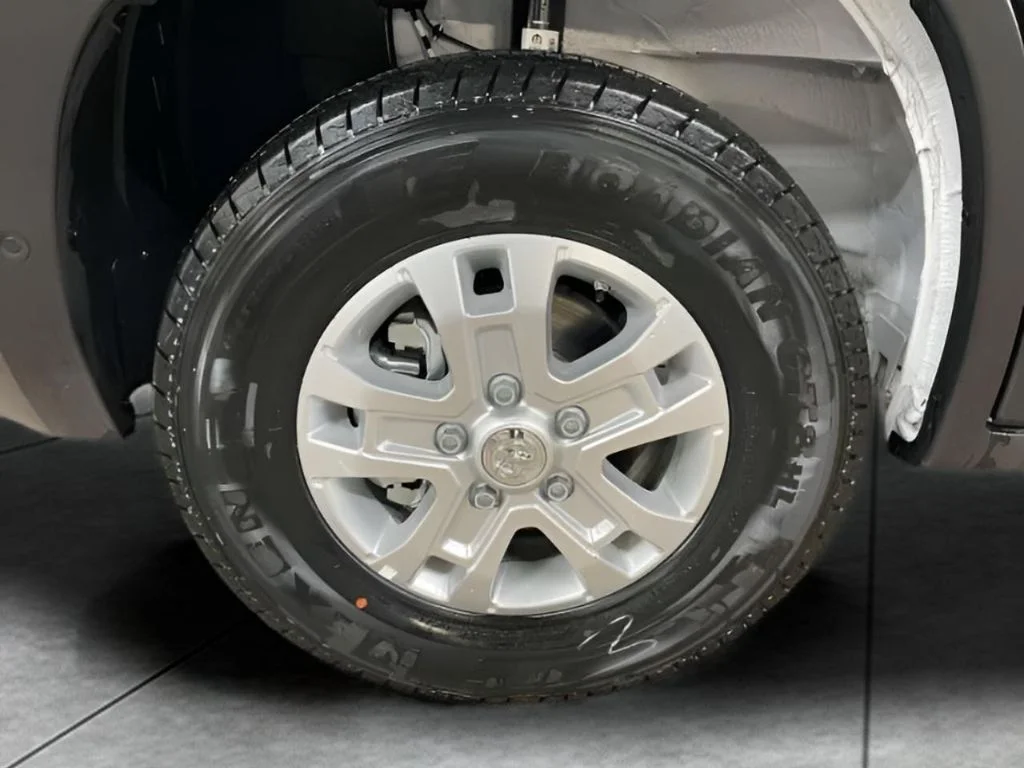 Used 2025 Bright White Clearcoat Ram SLT image 9