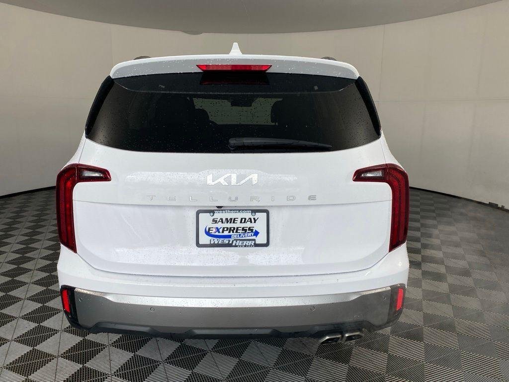 Used 2025 White Pearl Kia S image 7