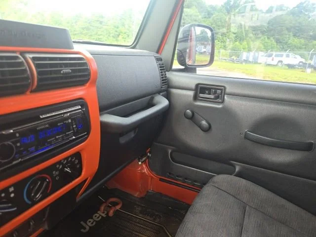 Used 2005 Impact Orange Cle Jeep Sport image 31