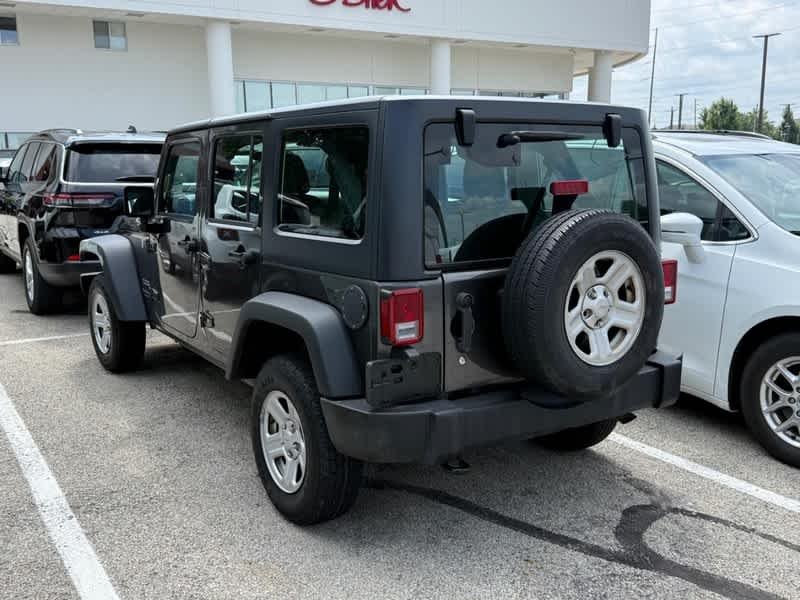 Used 2018 Granite Crystal Metallic Clearcoat Jeep Sport image 3