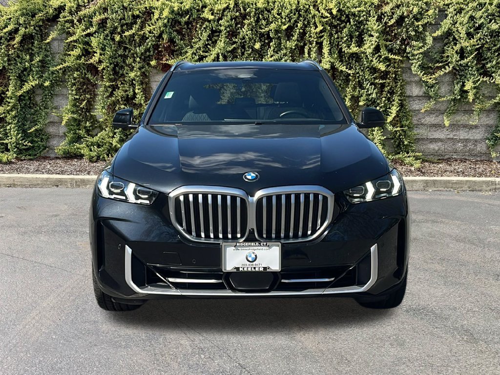 Used 2024 Black Sapphire Metallic BMW xDrive40i image 2