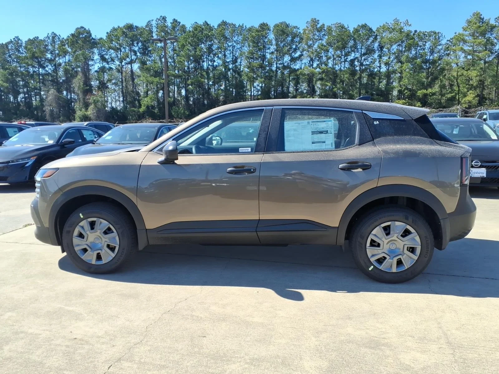 2026 Nissan Kicks S Brown at Robbins Nissan