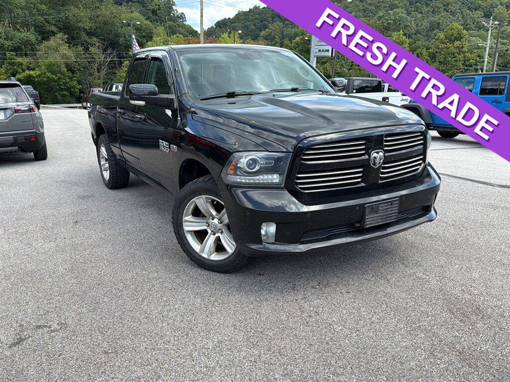 Used 2014 Black Clearcoat Ram Sport image 1