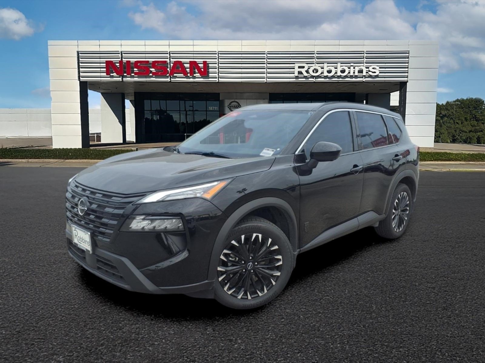 Certified Used 2026 Super Black Nissan Dark Armor image 1