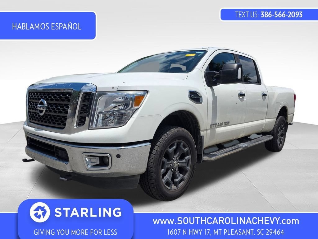 Used 2018 White Nissan SV Gas image 1