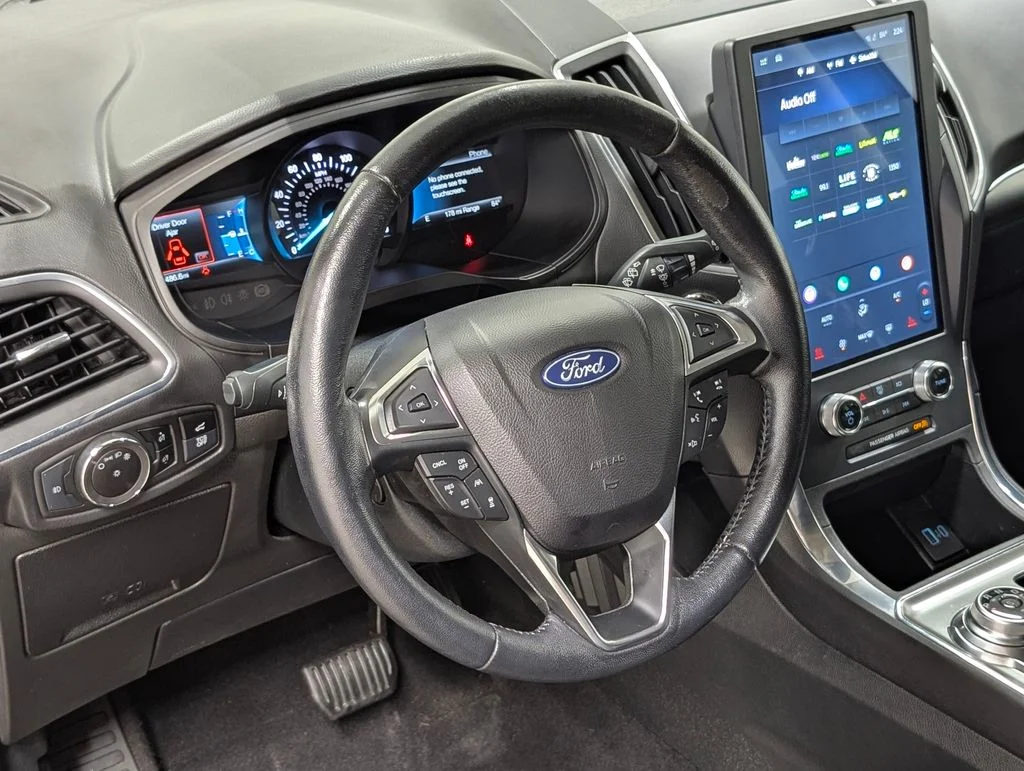 Certified Used 2023 Agate Black Metallic Ford Titanium image 9