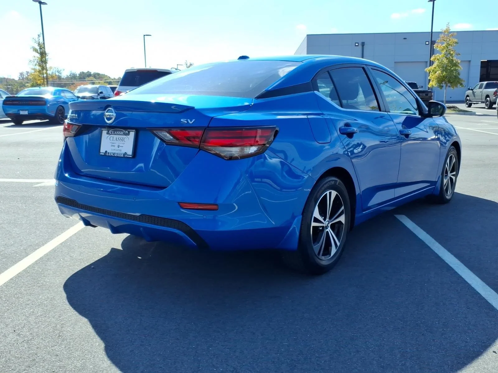 Used 2022 Electric Blue Metallic Nissan SV image 2