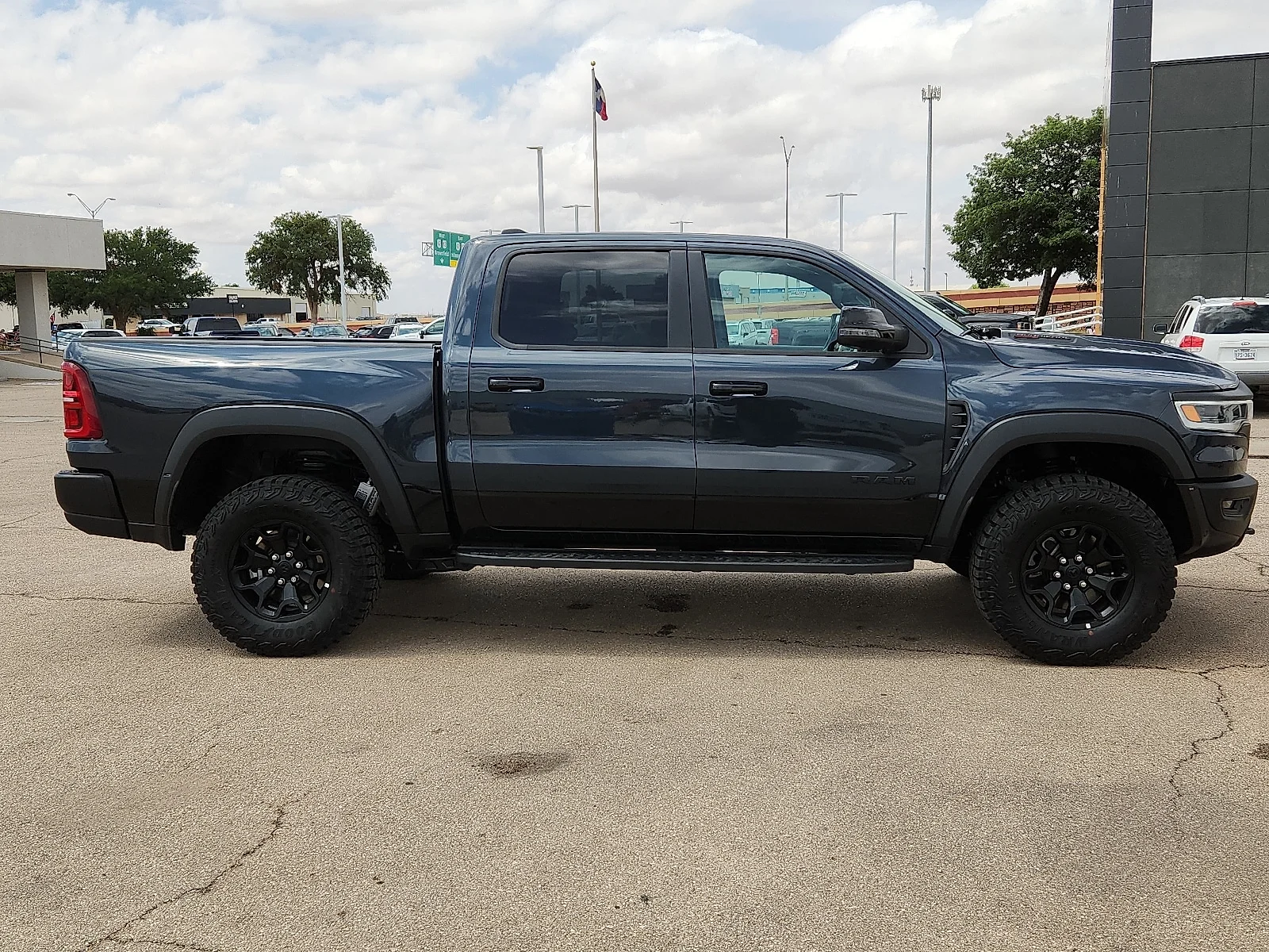 New 2026 Forged Blue Metallic  Paint Ram RHO CREW CAB 4X4 5