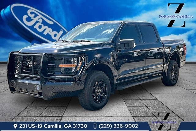 Used 2025 Agate Black Metallic Ford XLT image 1