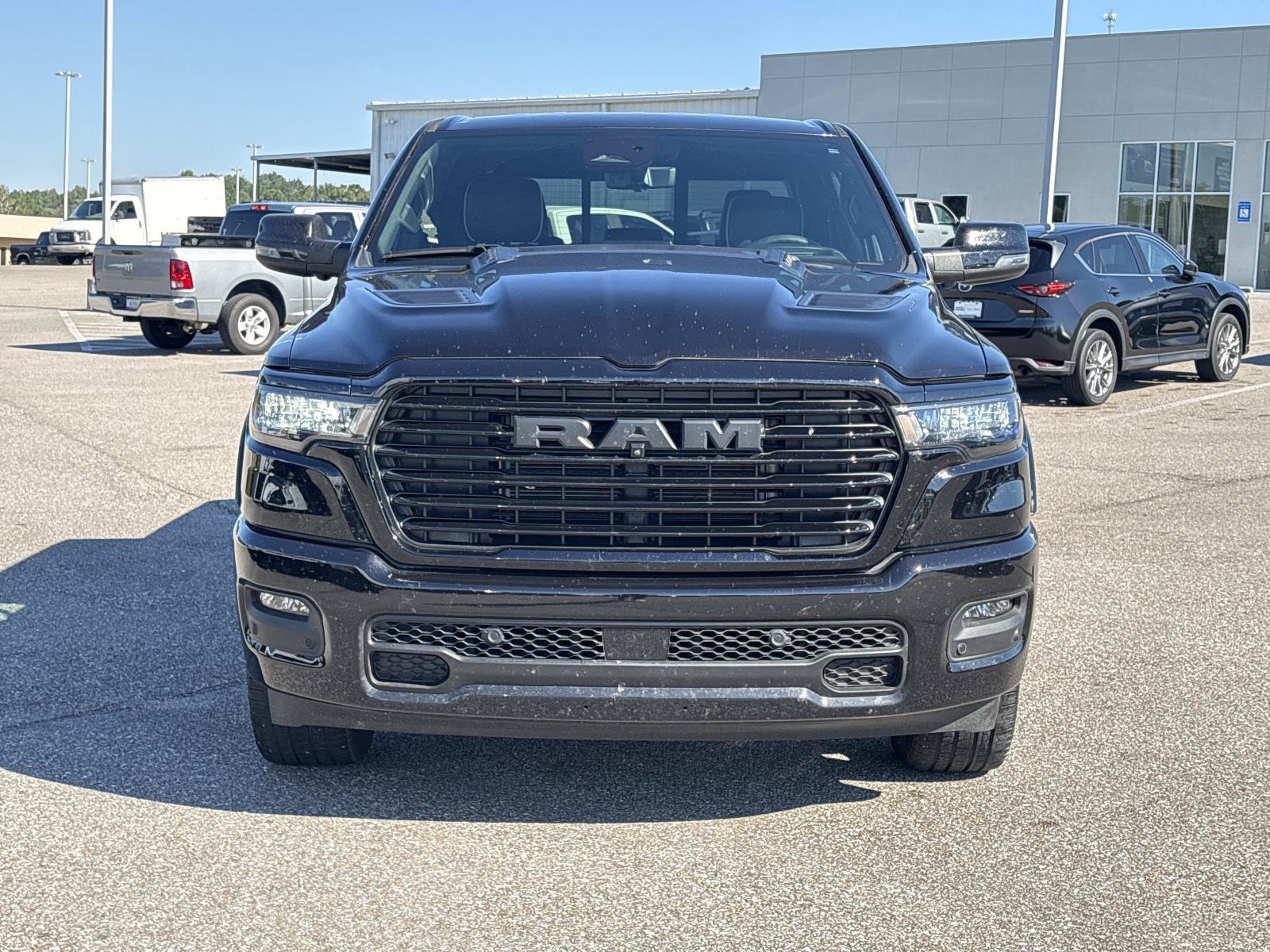 Used 2025 Diamond Black Crystal Pearlcoat Ram Laramie image 2