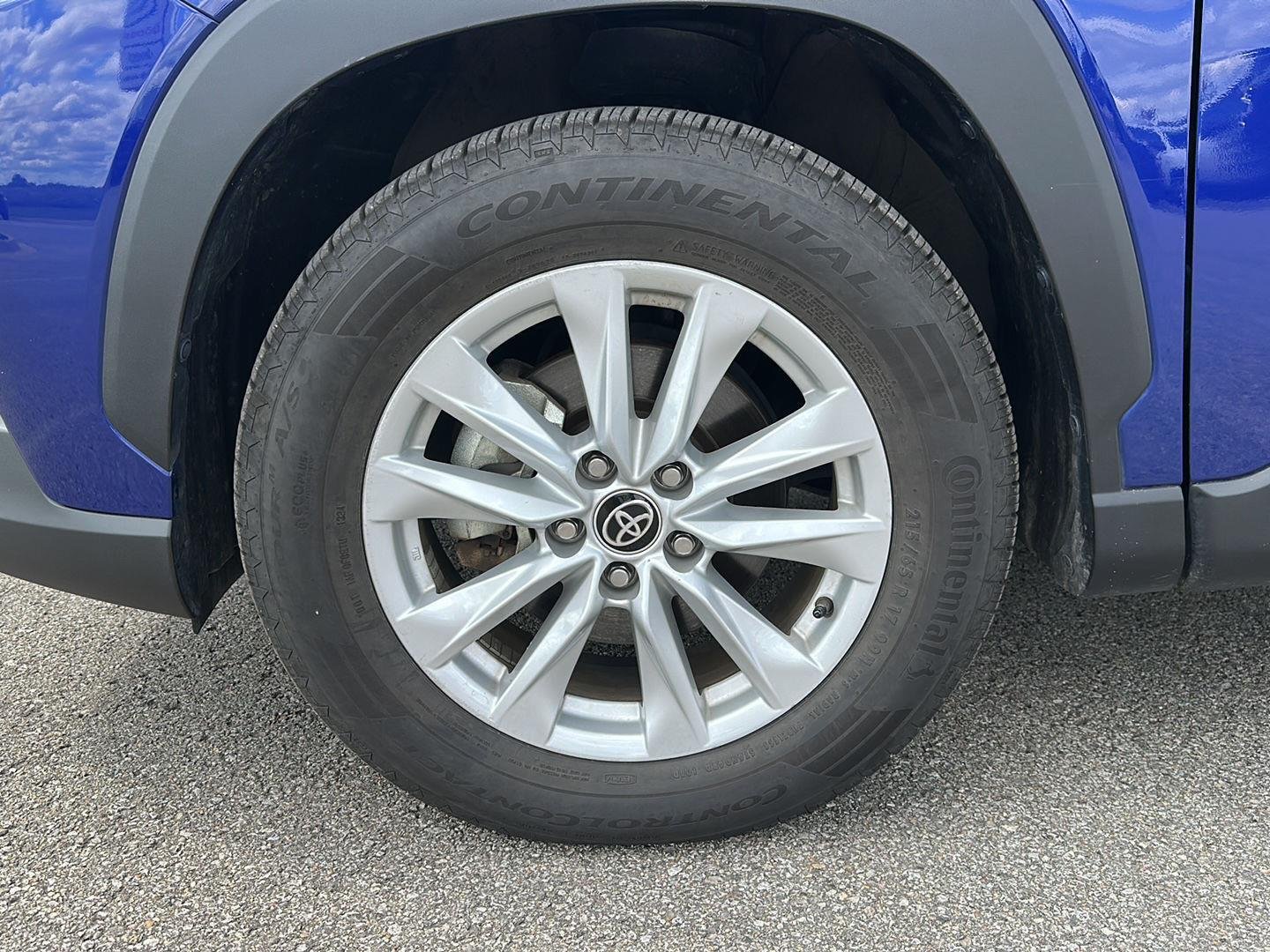 Used 2022 Blue Crush Metallic Toyota LE image 6