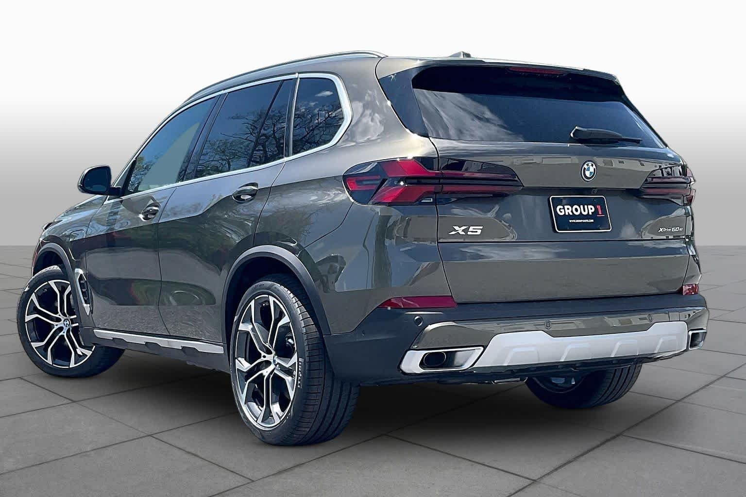 Used 2026 Manhattan Green Metallic BMW xDrive50e image 12