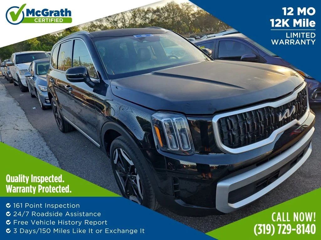 Used 2024 Black Kia EX image 1