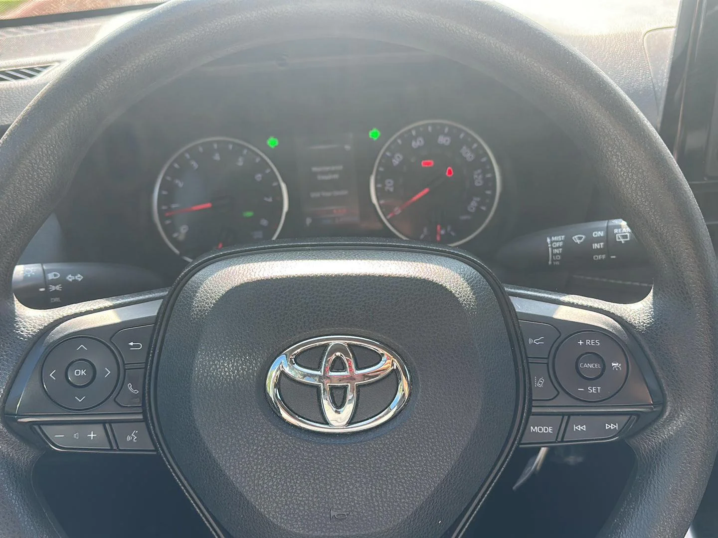 Used 2021 Magnetic Gray Metallic Toyota LE image 14
