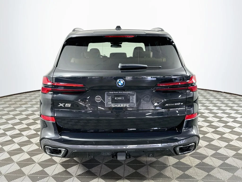 New 2026 Black Sapphire Metallic BMW xDrive50e image 6