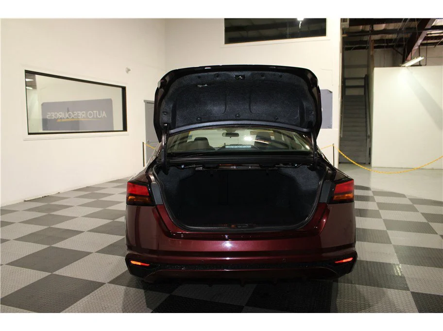 Used 2025 Garnet Pearl Metallic Nissan SV image 19
