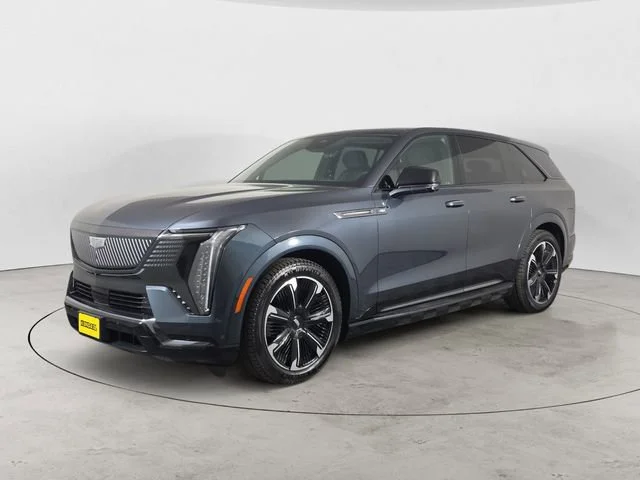 Used 2025 Deep Space Metallic Cadillac Sport 1 image 1