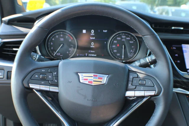 Used 2024 Argent Silver Metallic Cadillac FWD Premium Luxury image 9