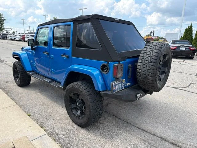 Used 2016 Blue Jeep Unlimited Sahara image 8
