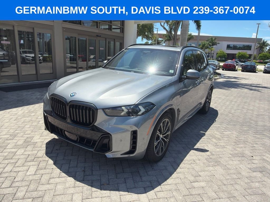 Certified Used 2024 Gray Metallic BMW xDrive50e image 1
