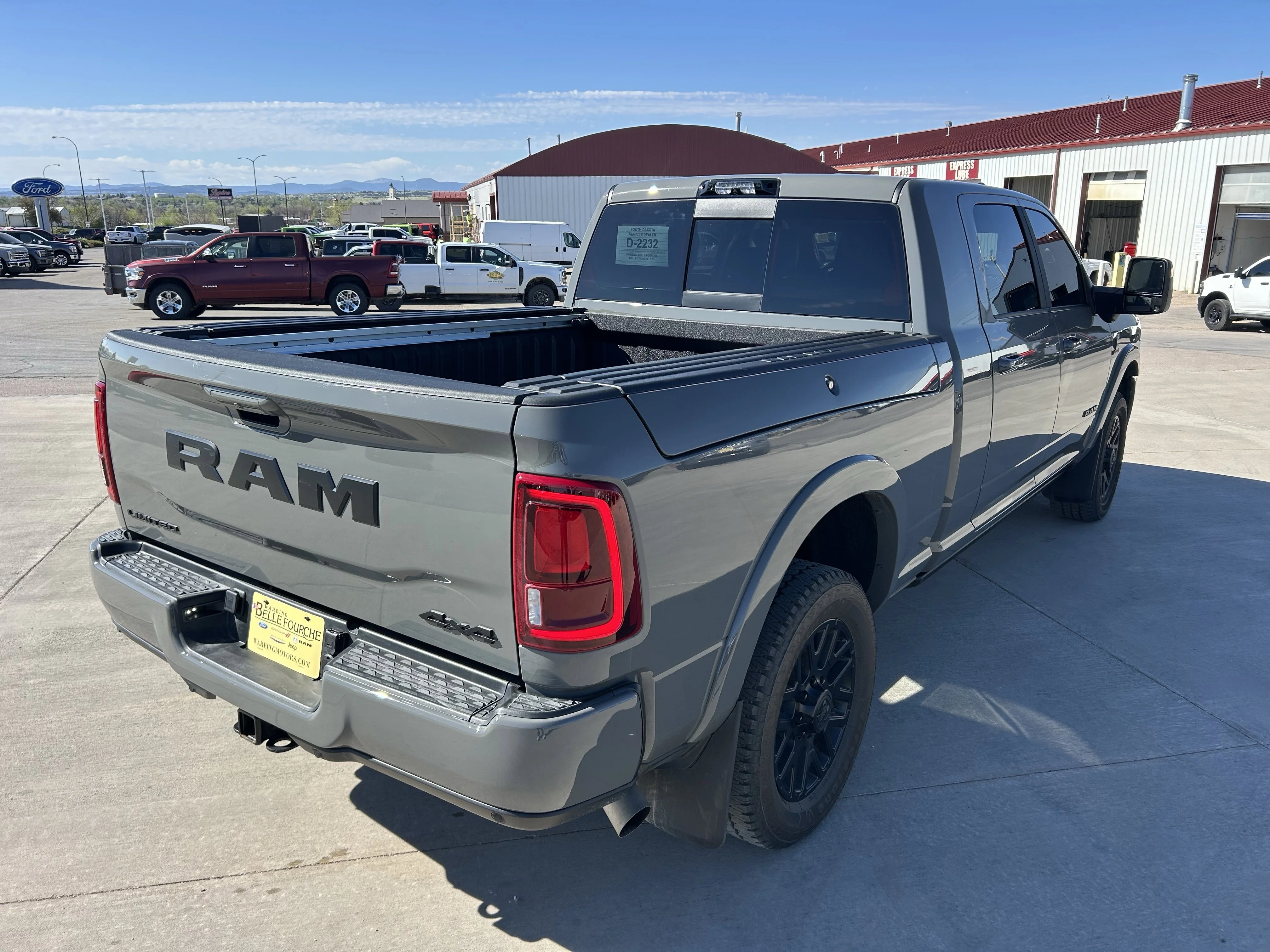 Used 2025 Ceramic Gray Clearcoat Ram Limited image 4