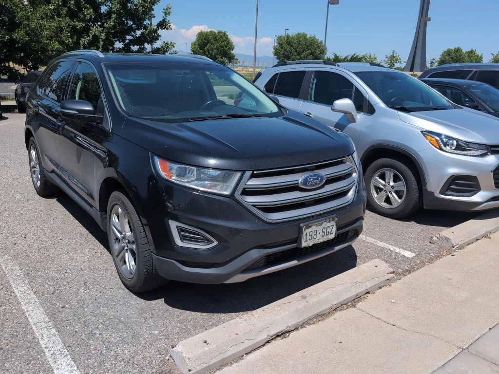 Used 2016 Shadow Black Ford Titanium image 4