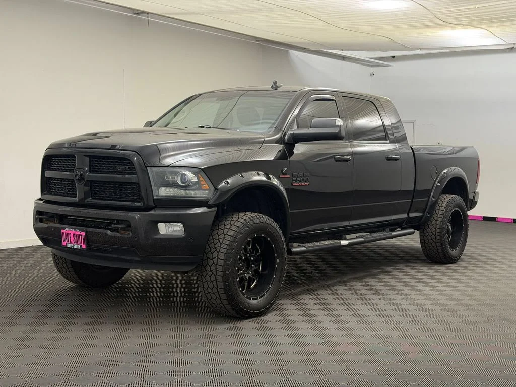 Used 2016 Brilliant Black Crystal Pearlcoat Ram Laramie image 1